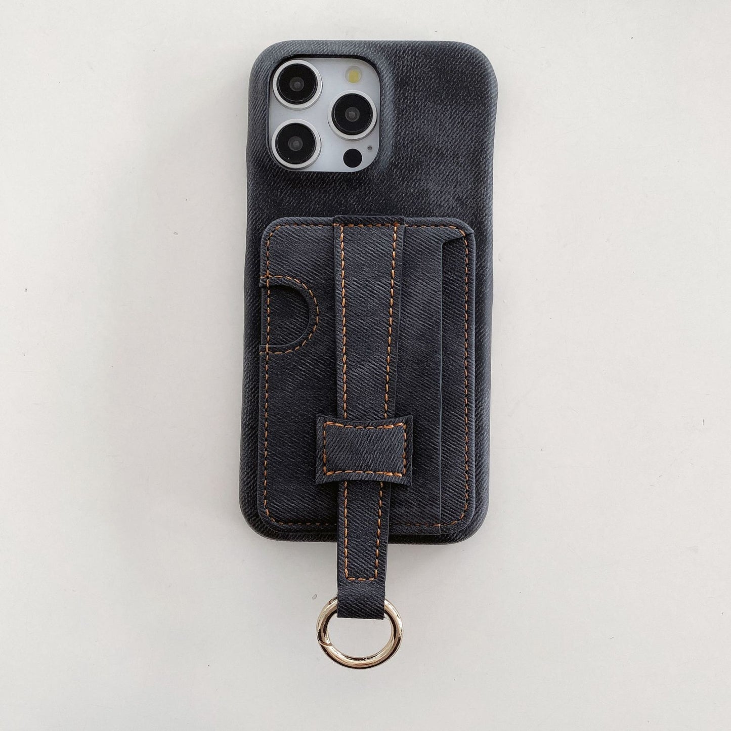 Denim-textured iPhone case with wrist strap and ring holder