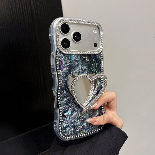 Rhinestone-studded heart-shaped mirror stand iPhone case with a shell pattern