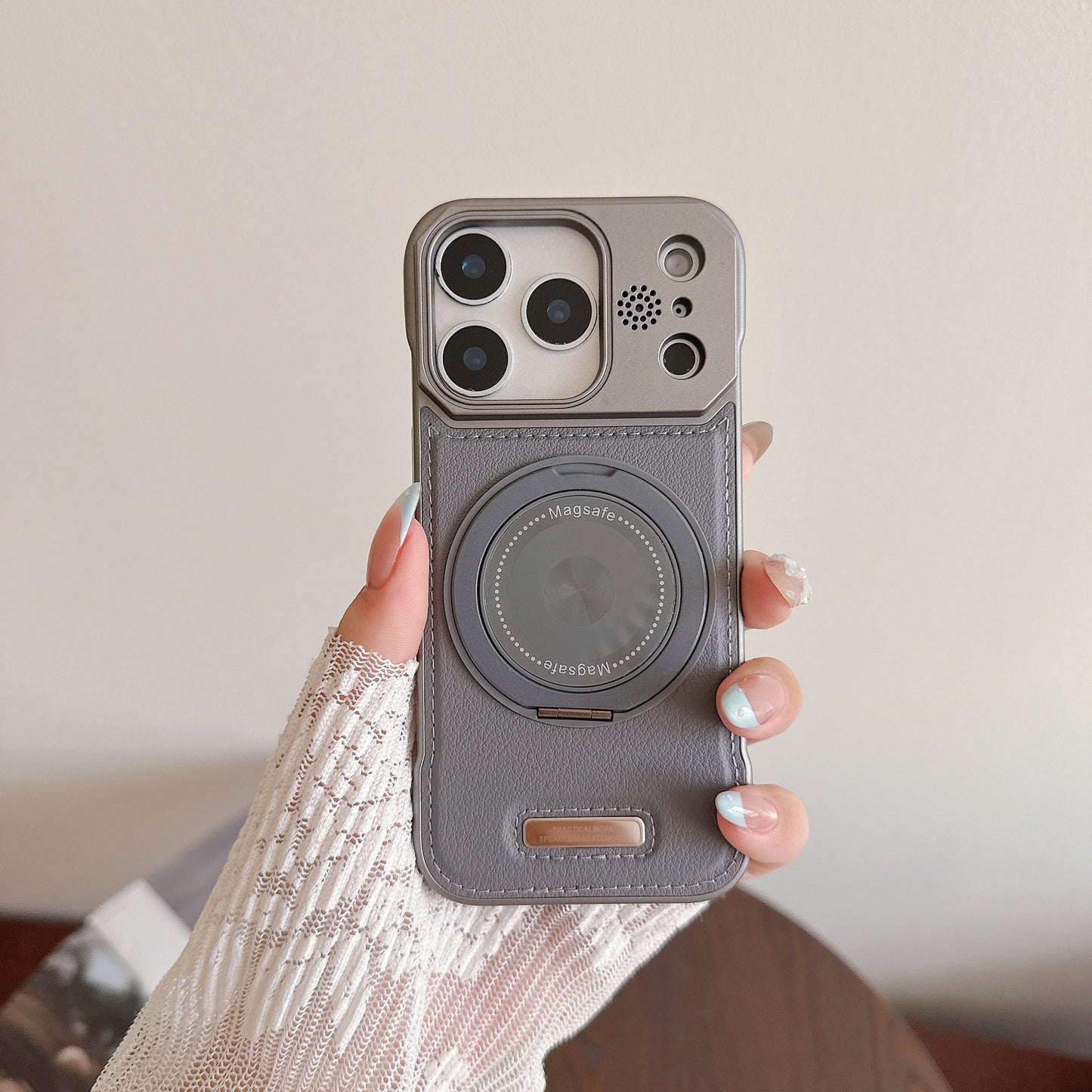 Frameless leather textured magnetic rotating stand Apple phone case